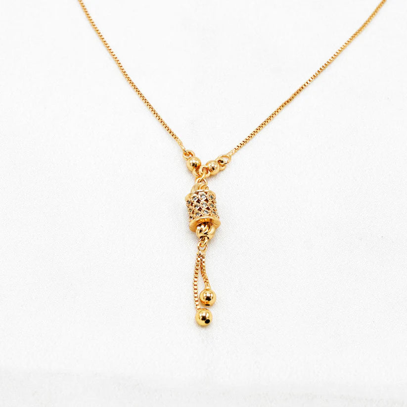 Fine quality beautiful dholna pendant in golden color. Studded with fine quality zircon. Imported from China.